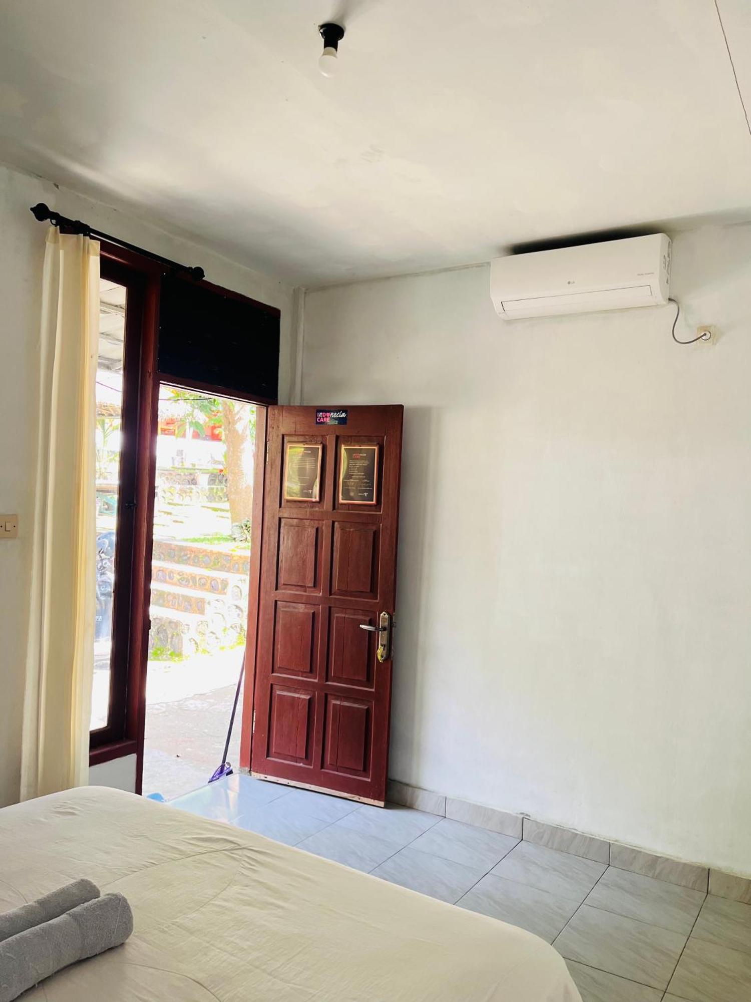 Perwita Homestay Kuta  Extérieur photo